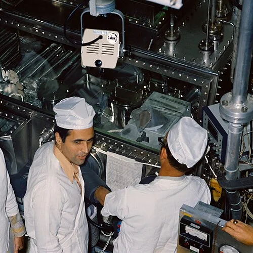 Scientists working with analytical equipment in a laboratory